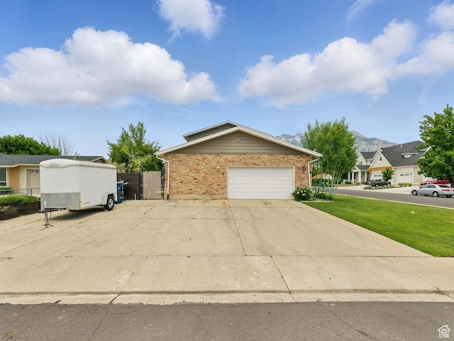 167 N 750 E, Orem, UT 84097 - view of front of house featuring brick siding, a gate, and a mountain view