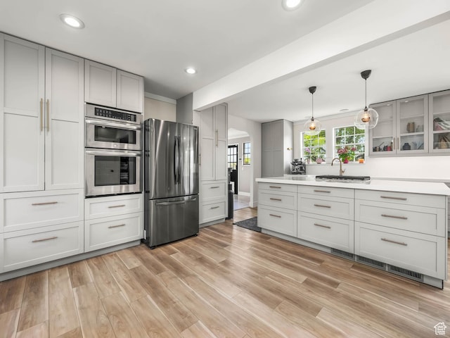 167 N 750 E, Orem, UT 84097 - kitchen with stainless steel appliances, a sink, gray cabinetry, light countertops, and recessed lighting