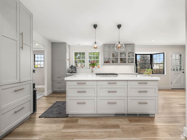 167 N 750 E, Orem, UT 84097 - kitchen featuring glass insert cabinets, baseboards, gray cabinets, light countertops, and recessed lighting