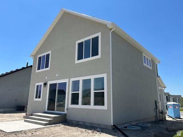 572 N 600 W, Smithfield, UT 84335 - rear view of property with central AC and stucco siding