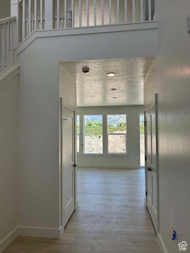 572 N 600 W, Smithfield, UT 84335 - corridor with baseboards and light wood finished floors