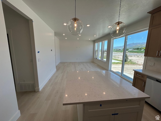 572 N 600 W, Smithfield, UT 84335 - unfurnished dining area with baseboards, light wood-type flooring, recessed lighting, and a mountain view