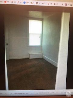 827 E 26th St, Ogden, UT 84401 - spare room featuring baseboards and carpet flooring