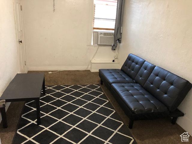 827 E 26th St, Ogden, UT 84401 - sitting room with carpet floors, cooling unit, and baseboards