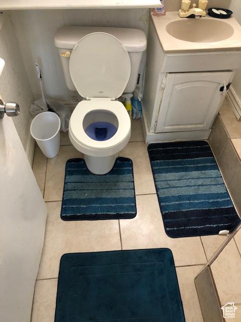 827 E 26th St, Ogden, UT 84401 - bathroom with toilet, tile patterned floors, and vanity