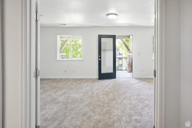 11411 S Oakmond Rd, South Jordan, UT 84009 - empty room featuring carpet flooring, plenty of natural light, and baseboards