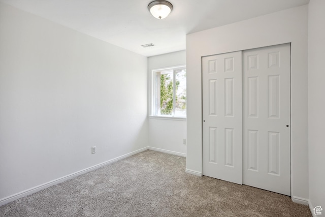 11411 S Oakmond Rd, South Jordan, UT 84009 - unfurnished bedroom featuring carpet flooring, a closet, and baseboards