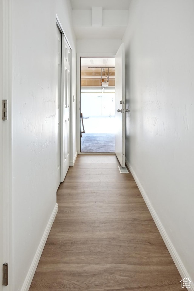 11411 S Oakmond Rd, South Jordan, UT 84009 - hallway featuring baseboards and wood finished floors