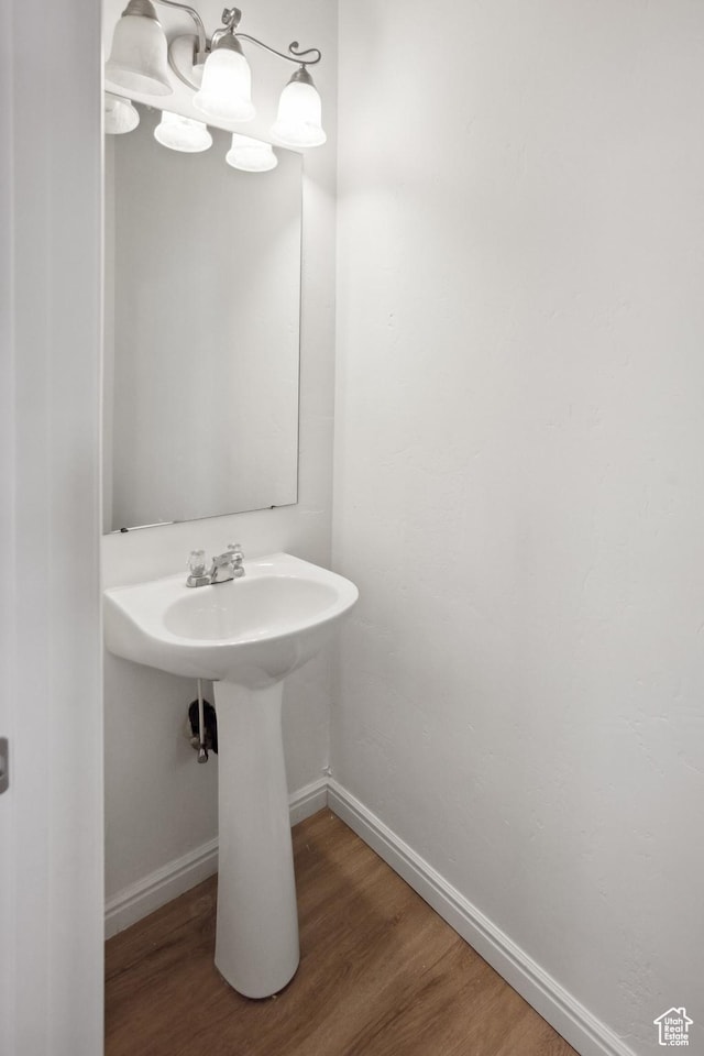11411 S Oakmond Rd, South Jordan, UT 84009 - bathroom with wood finished floors, baseboards, and a sink