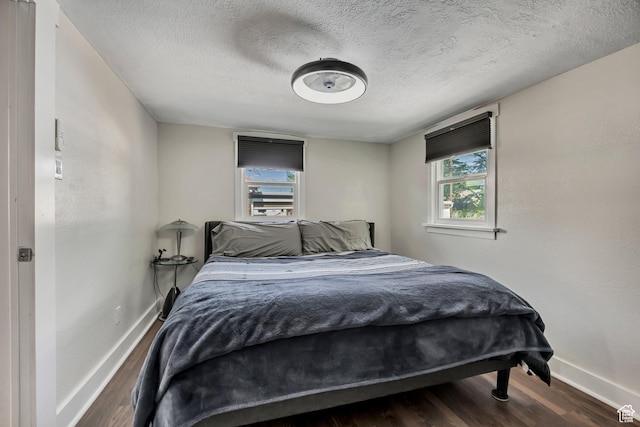 763 E Spring View Dr, Millcreek, UT 84106 - bedroom with wood finished floors and a textured ceiling