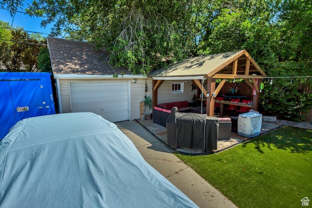 763 E Spring View Dr, Millcreek, UT 84106 - view of front of home with outdoor lounge area, a gazebo, concrete driveway, a front yard, and roof with shingles