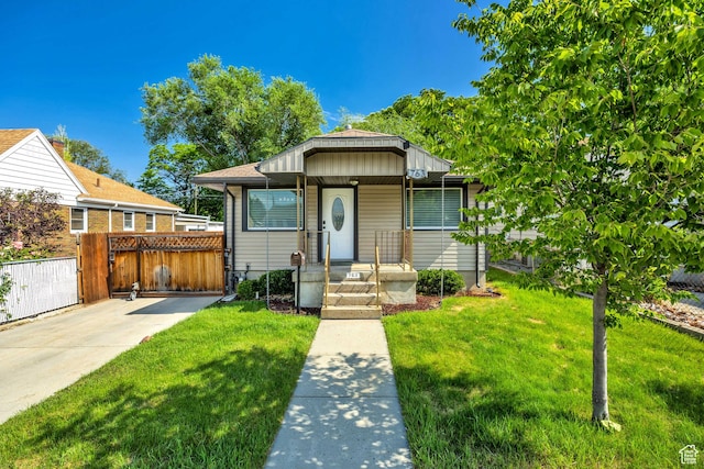 763 E Spring View Dr, Millcreek, UT 84106 - bungalow-style house with a gate