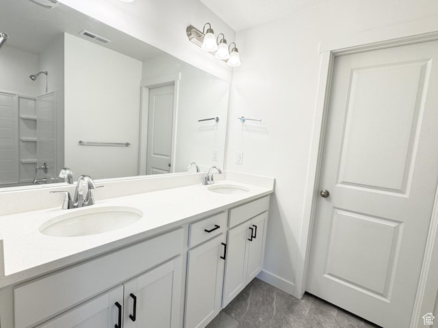 6648 W 11800 S, South Jordan, UT 84009 - bathroom with double vanity, baseboards, and shower / tub combination