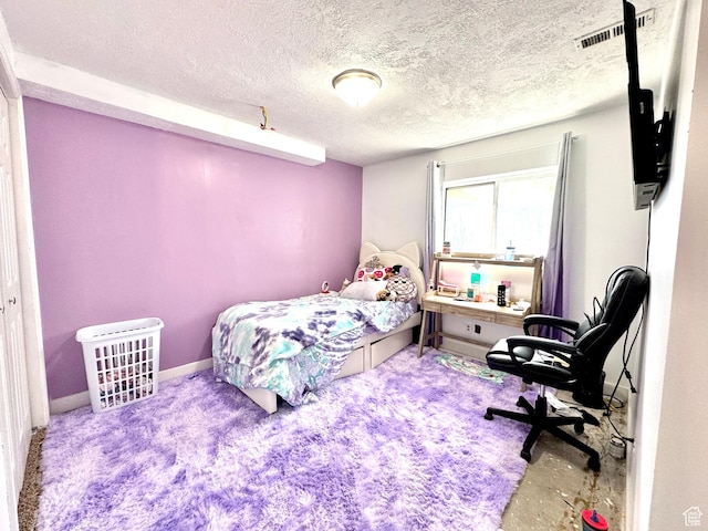 574 N Jackson Ave, Ogden, UT 84404 - bedroom with a textured ceiling and baseboards