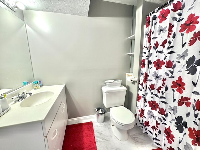 574 N Jackson Ave, Ogden, UT 84404 - bathroom with vanity, toilet, marble finish floors, baseboards, and a shower with shower curtain