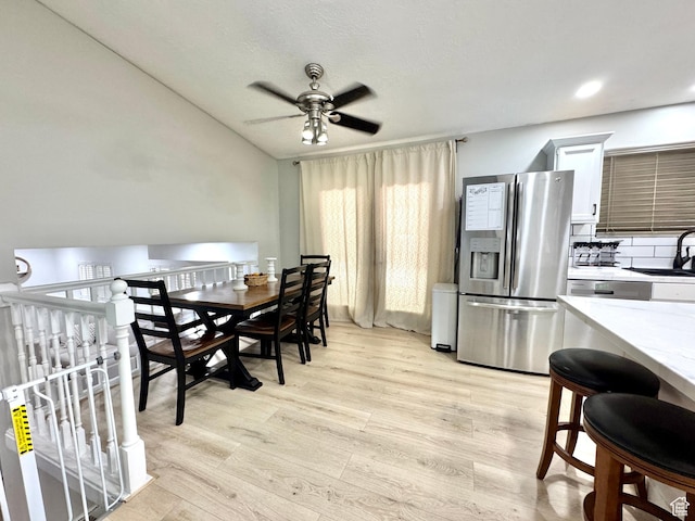 574 N Jackson Ave, Ogden, UT 84404 - dining area featuring a ceiling fan and light wood-type flooring