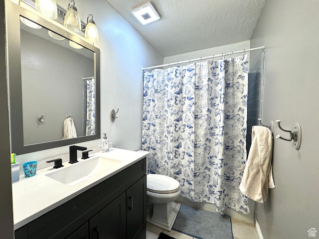 574 N Jackson Ave, Ogden, UT 84404 - full bathroom featuring vanity, toilet, a textured ceiling, and a shower with curtain