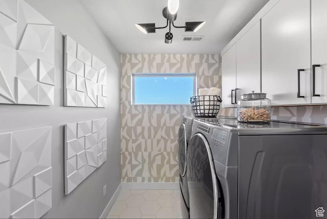 5877 N Canyon Rim Rd Unit 623, Lehi, UT 84043 - laundry area with washing machine and dryer, cabinet space, wallpapered walls, baseboards, and light tile patterned flooring