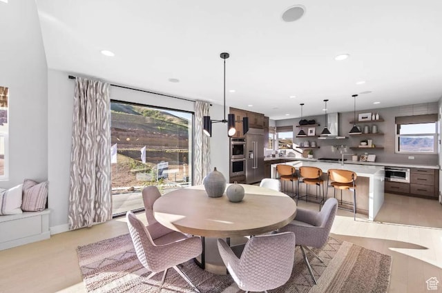 5877 N Canyon Rim Rd Unit 623, Lehi, UT 84043 - dining space featuring recessed lighting and light wood-style flooring