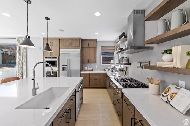 5877 N Canyon Rim Rd Unit 623, Lehi, UT 84043 - kitchen featuring open shelves, island range hood, appliances with stainless steel finishes, a sink, and backsplash