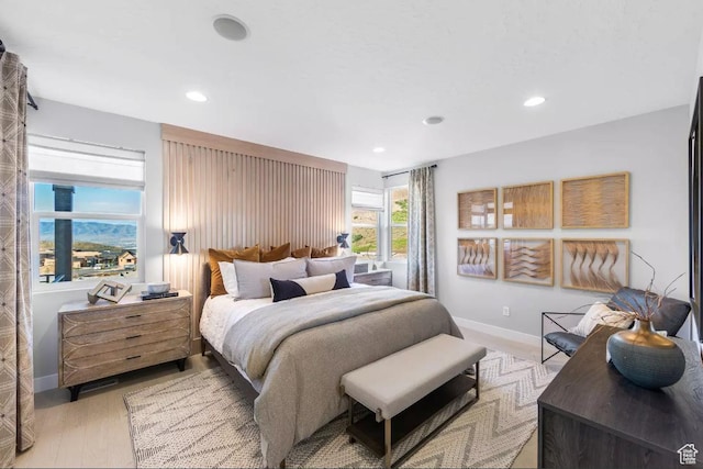 5877 N Canyon Rim Rd Unit 623, Lehi, UT 84043 - bedroom with recessed lighting, baseboards, and light wood finished floors