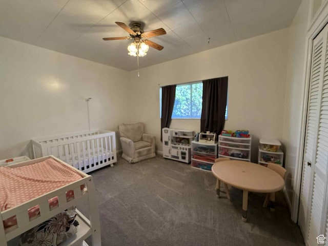 229 N Carbon Ave, Price, UT 84501 - carpeted bedroom with radiator heating unit, a closet, a ceiling fan, and a crib