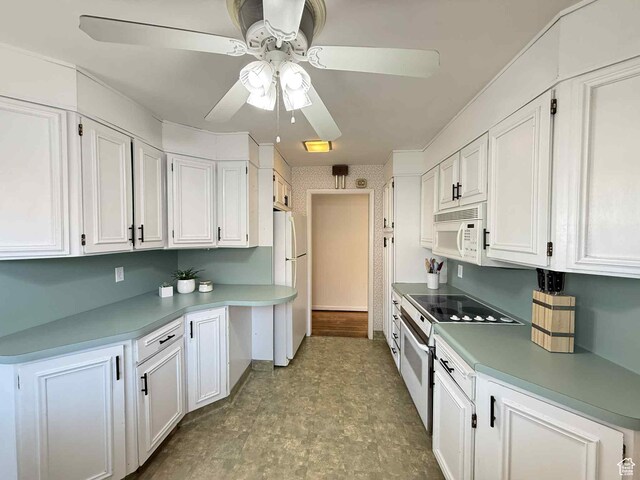 229 N Carbon Ave, Price, UT 84501 - kitchen featuring white appliances, a ceiling fan, white cabinets, light countertops, and tile patterned floors