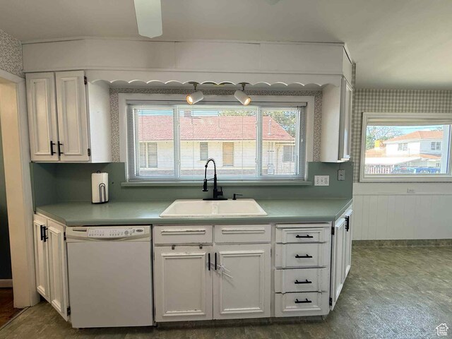 229 N Carbon Ave, Price, UT 84501 - kitchen with white dishwasher, a sink, white cabinetry, a ceiling fan, and light countertops