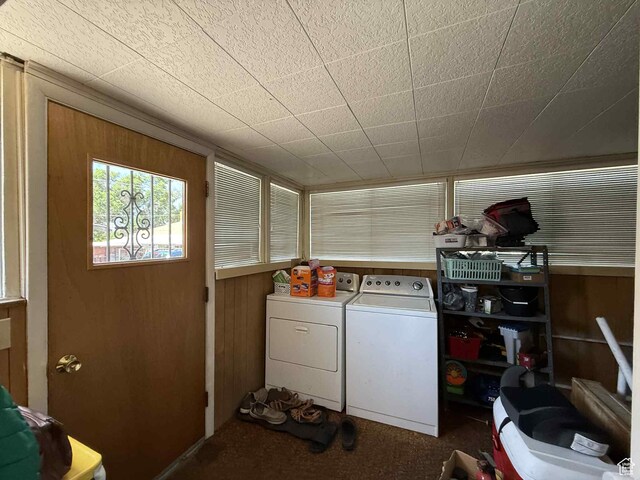 229 N Carbon Ave, Price, UT 84501 - laundry room with independent washer and dryer, carpet, and wood walls