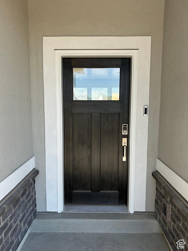554 N 800 W, Smithfield, UT 84335 - property entrance with stucco siding