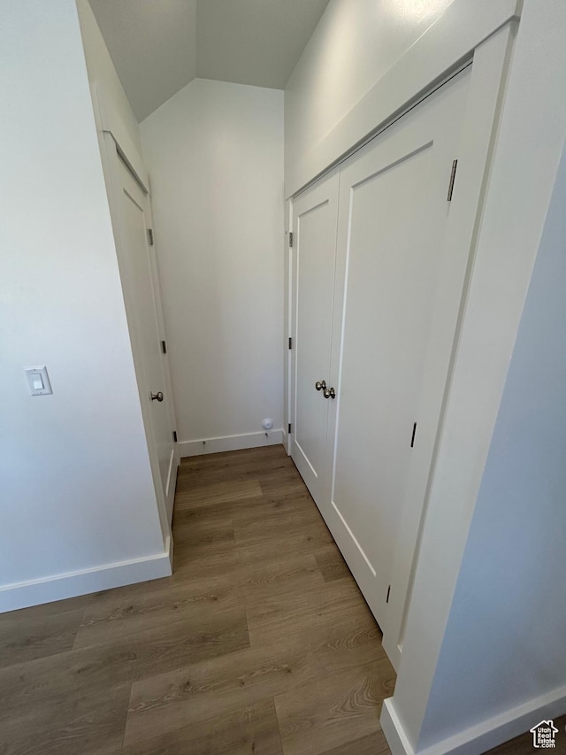 554 N 800 W, Smithfield, UT 84335 - hallway with wood finished floors, vaulted ceiling, and baseboards