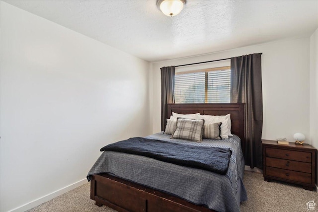 2631 W 5625 S, Roy, UT 84067 - bedroom featuring carpet flooring, baseboards, and a textured ceiling