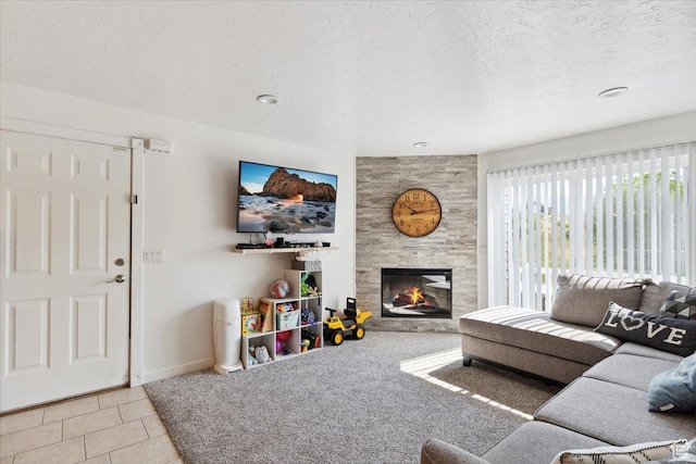 2631 W 5625 S, Roy, UT 84067 - living room featuring a fireplace, baseboards, a textured ceiling, and tile patterned floors