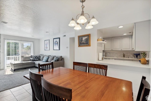2631 W 5625 S, Roy, UT 84067 - dining room featuring a chandelier
