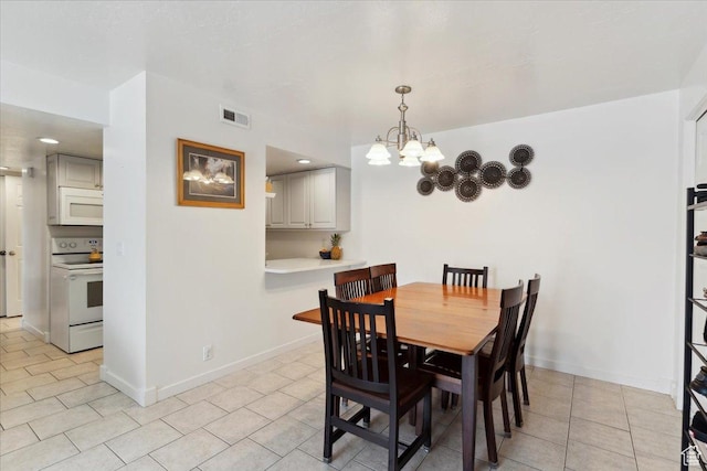 2631 W 5625 S, Roy, UT 84067 - dining space with light tile patterned flooring, a chandelier, baseboards, and recessed lighting