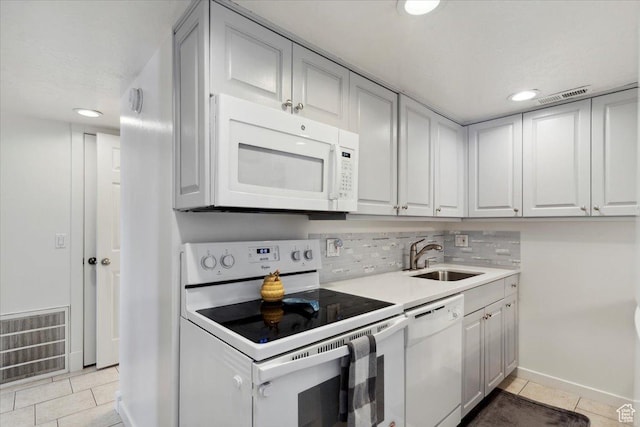 2631 W 5625 S, Roy, UT 84067 - kitchen featuring white appliances, a sink, light tile patterned floors, baseboards, and recessed lighting