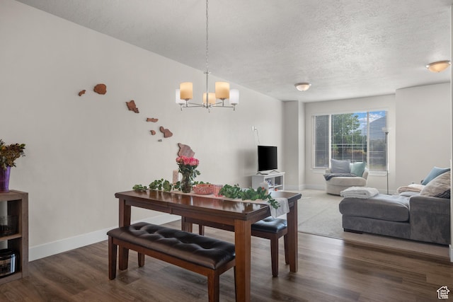 1871 S 1030 W, Orem, UT 84058 - dining room with a textured ceiling, a chandelier, dark wood finished floors, and baseboards