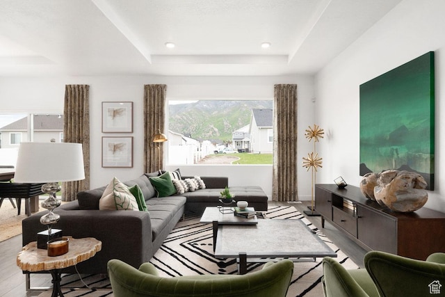 4111 W 1575 S Unit 118, Ogden, UT 84404 - living room featuring a raised ceiling, wood finished floors, and recessed lighting