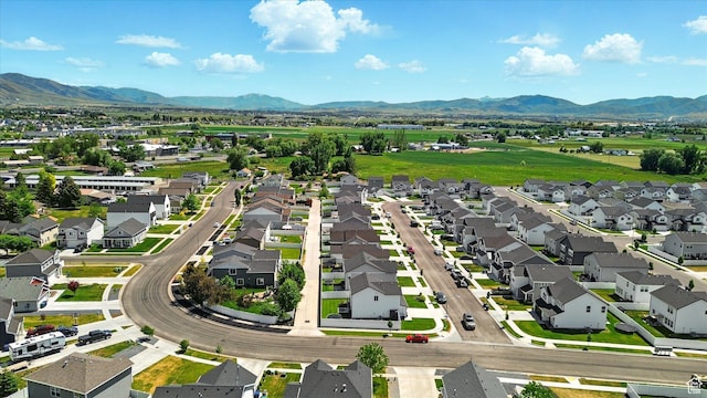 2124 S 1490 W, Wellsville, UT 84339 - aerial view of residential area featuring a mountainous background