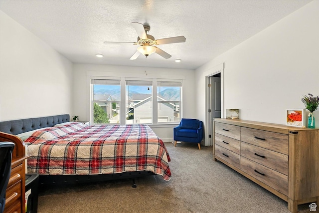 2124 S 1490 W, Wellsville, UT 84339 - bedroom with light colored carpet, a ceiling fan, and a textured ceiling