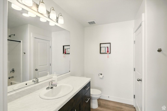 2124 S 1490 W, Wellsville, UT 84339 - full bath with vanity, wood finished floors, and shower / bath combination