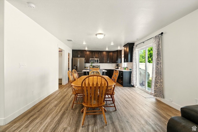 2124 S 1490 W, Wellsville, UT 84339 - dining room with light wood finished floors