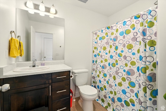 2124 S 1490 W, Wellsville, UT 84339 - bathroom featuring vanity, wood finished floors, and a shower with shower curtain