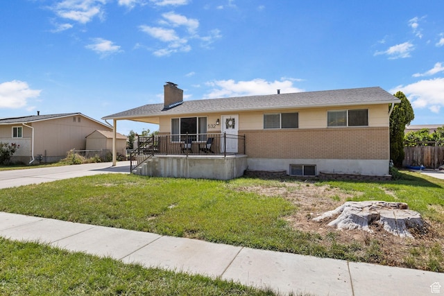 532 S 1500 E, Spanish Fork, UT 84660 - view of front facade with brick siding and a chimney