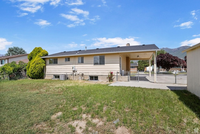 532 S 1500 E, Spanish Fork, UT 84660 - back of property featuring central AC unit, a gate, and a chimney