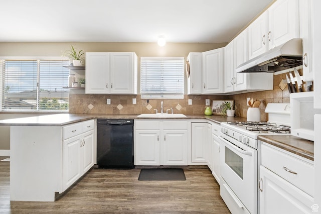532 S 1500 E, Spanish Fork, UT 84660 - kitchen featuring black dishwasher, white range with gas stovetop, a sink, under cabinet range hood, and wood finished floors