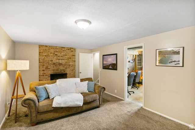 532 S 1500 E, Spanish Fork, UT 84660 - living area with carpet flooring, baseboards, a brick fireplace, and a desk