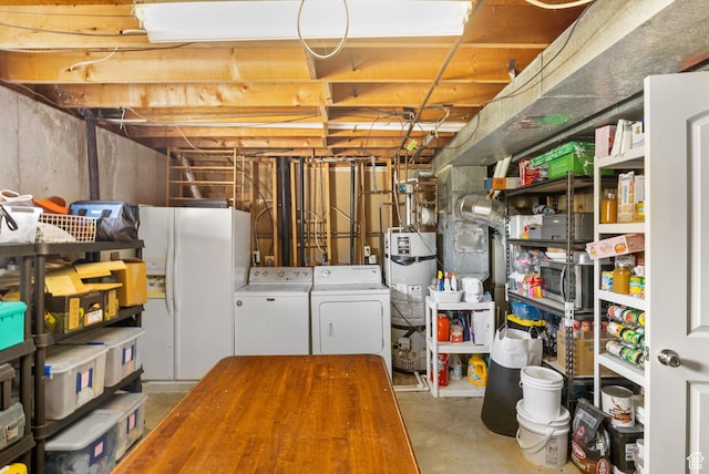 532 S 1500 E, Spanish Fork, UT 84660 - unfinished below grade area featuring washer and clothes dryer, white refrigerator with ice dispenser, and water heater