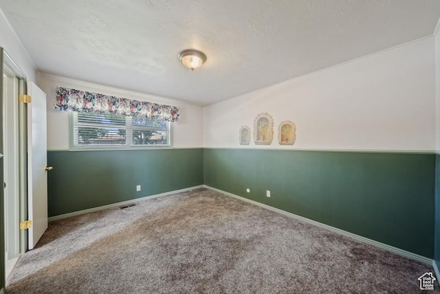 71 W Princeton Dr, Midvale, UT 84047 - carpeted spare room featuring a textured ceiling and baseboards