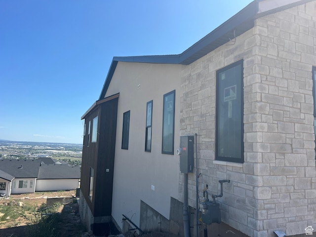 1293 W Caribou Ct, Pleasant View, UT 84414 - view of home's exterior featuring stucco siding